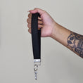 Load image into Gallery viewer, Vinyl key fob with silver hardware.
