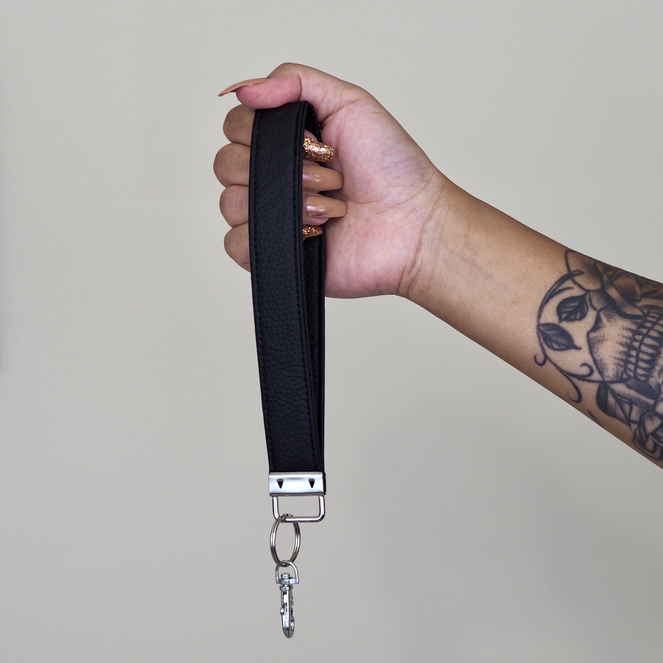 Vinyl key fob with silver hardware.