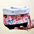 Load image into Gallery viewer, We rise by lifting others yarn project bag.
