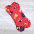 Load image into Gallery viewer, Rescued and Loved Bone Shaped Holiday Stocking-The Steady Hand
