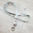 Load image into Gallery viewer, Skinny Fabric Lanyard Birdies All Around with Optional Badge/Vaccine Card Holder - 15" drop & 1/2" wide-The Steady Hand
