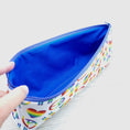 Load image into Gallery viewer, Blue interior zipper pouch.
