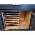 Load image into Gallery viewer, Deluxe muffin pan organizer horizontal in kitchen cabinet.
