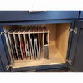 Load image into Gallery viewer, Deluxe muffin pan vertical in kitchen cabinet. 
