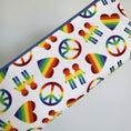 Load image into Gallery viewer, Zipper pouch with rainbow peace heart.
